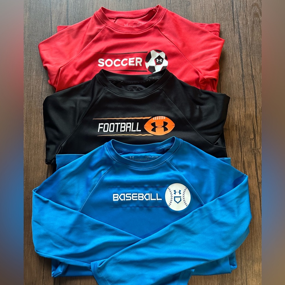 3 Boys sports Under Armour shirts